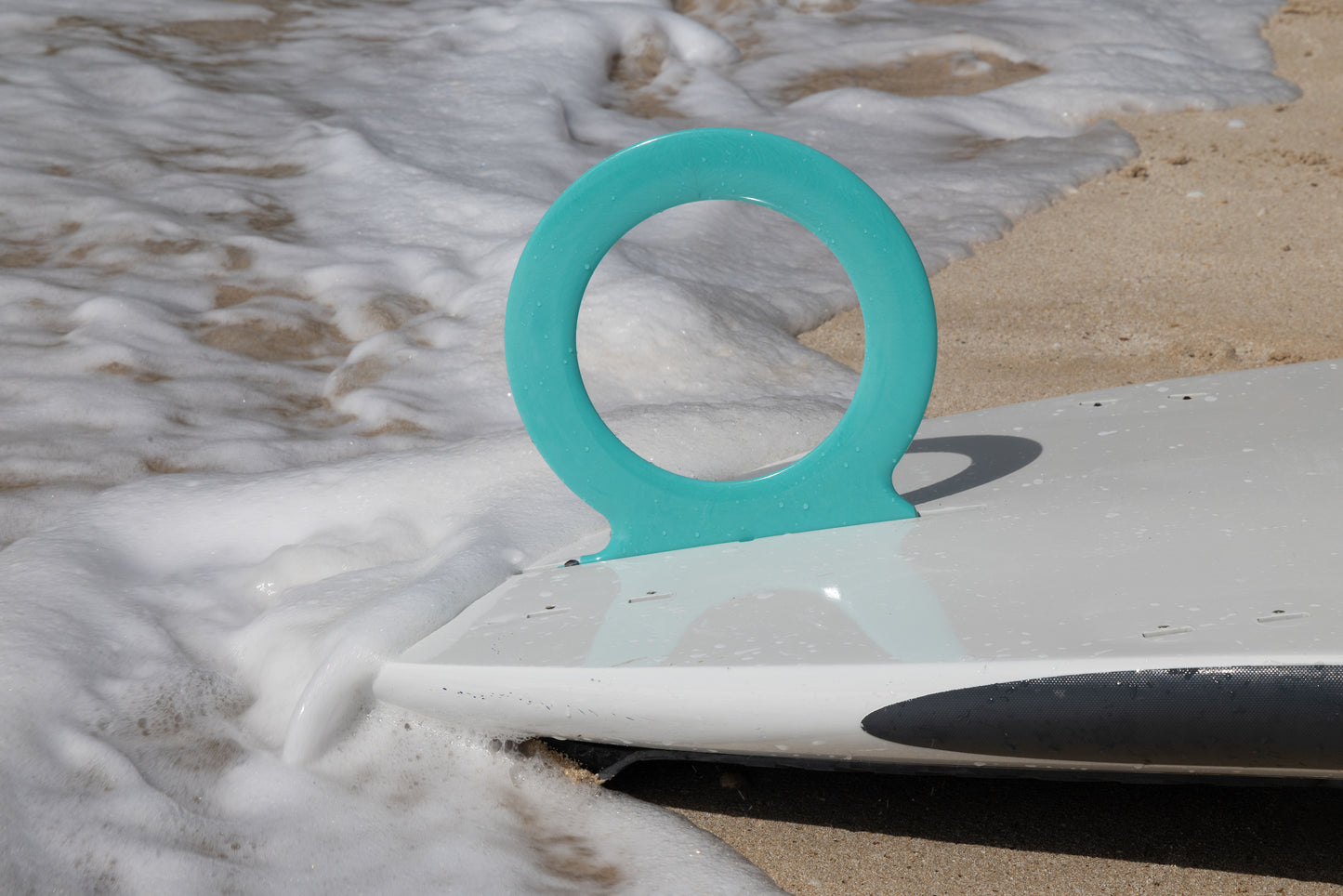 The O-Fin is the world's first and only circular fin. Shown in aqua. Photo credit: Roddy / Acquafilms