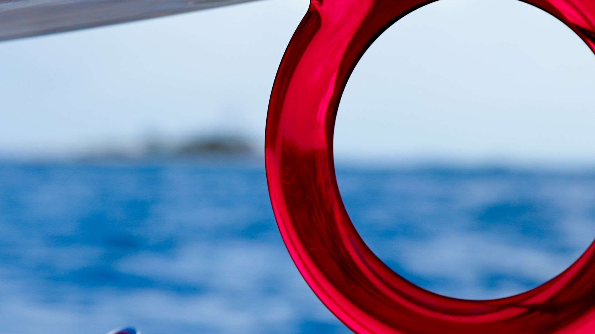 The O-Fin is the world's first and only circular fin.  Shown in crystal red. Photo credit: Roddy / Acquafilms