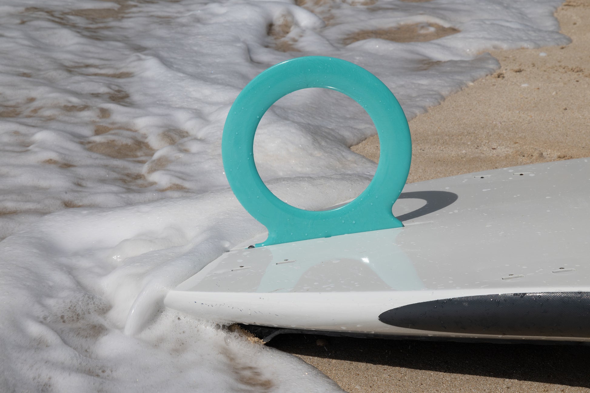 The O-Fin is the world's first and only circular fin.  Shown in aqua. Photo credit: Roddy / Acquafilms