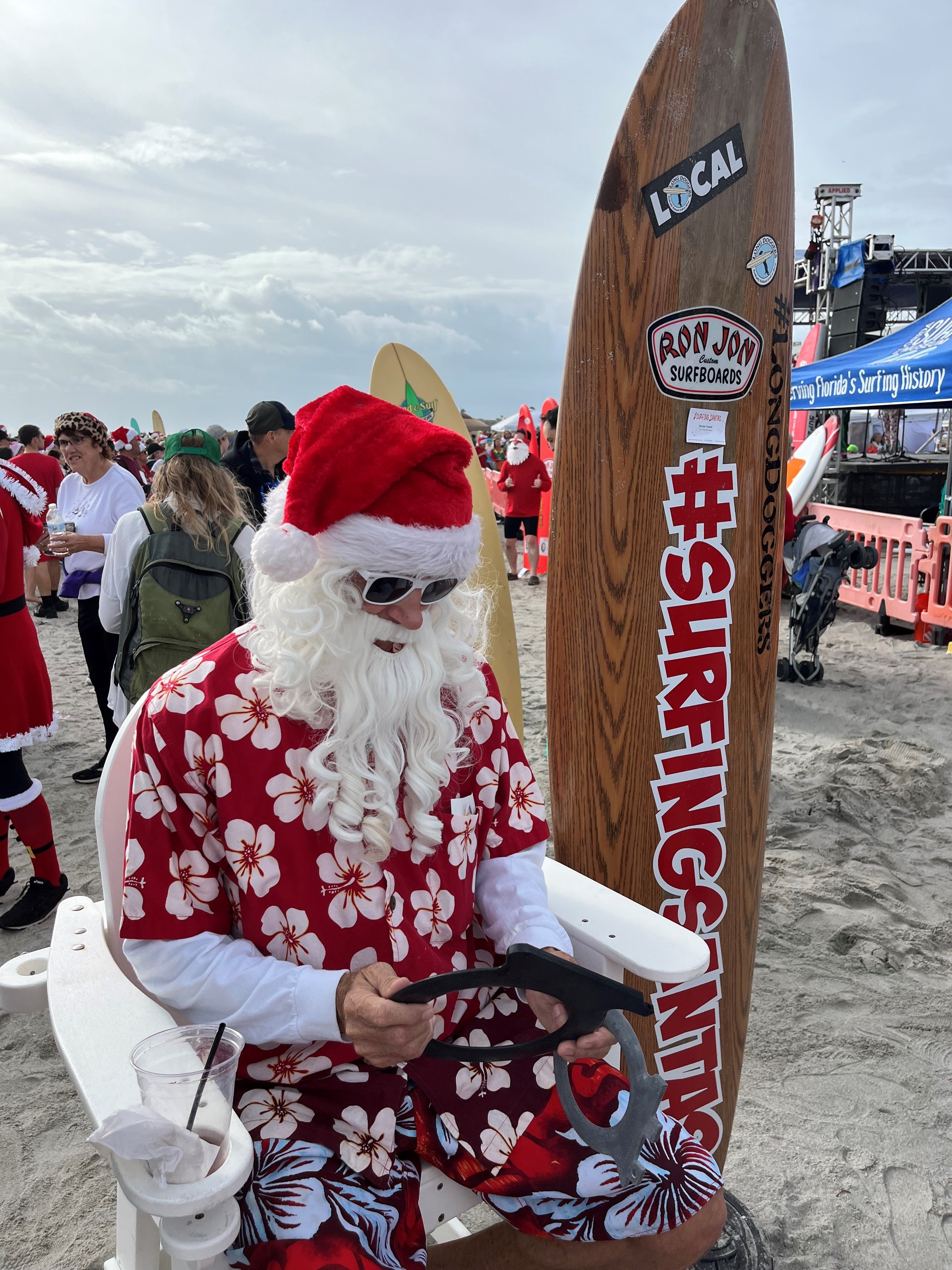 Santa checking out the new O-Fin #surfinsantas #gift #surfing